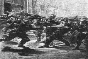 Schwarze und weiße Illustration einer gewalttätigen Straßenkrawall unter einer Gruppe von Männern, mit einem Gebäude im Hintergrund und der Bildunterschrift "Victorian riots in London, England" unten.