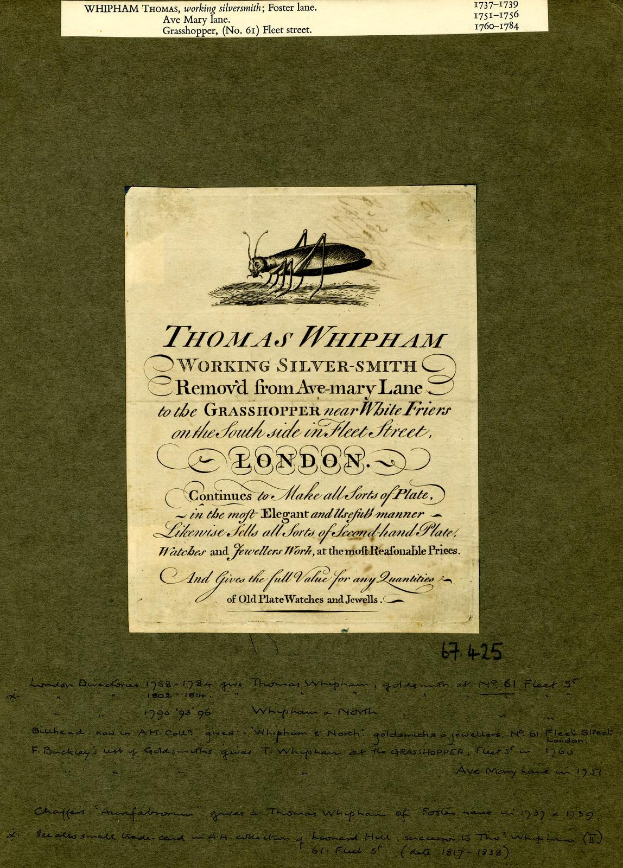 Altes Buch mit einer Zeichnung eines Grashüpfers auf dem Cover und Text auf den Seiten.