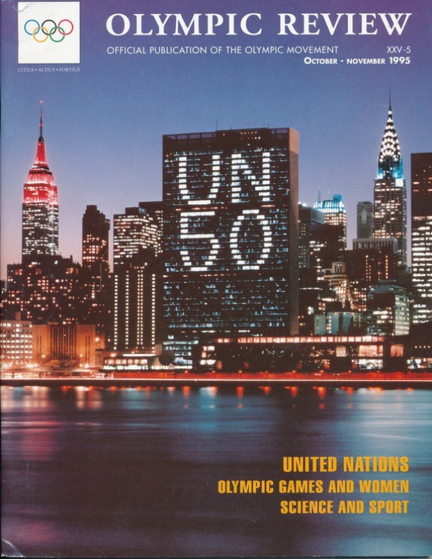 Titelbild des "Olympic Review Official Publication of the Olympic Movement"-Buchs, das eine Stadtansicht mit Gebäuden, Lichtern und Wasser zeigt und den Text "United Nations Olympic Games and Women Science and Sport" enthält.