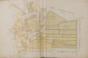 Ein altes Buch mit einer detaillierten Karte von Hamburg, Deutschland, das Straßen, Gebäude und Sehenswürdigkeiten zeigt und von Text begleitet wird, der Informationen über die Stadt enthält.