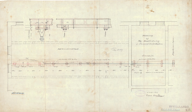 Detailierte Zeichnung einer Eisenbahnschiene auf Papier, einschließlich Schienen, Lokomotiven und anderen Komponenten, mit begleitendem erklärendem Text.