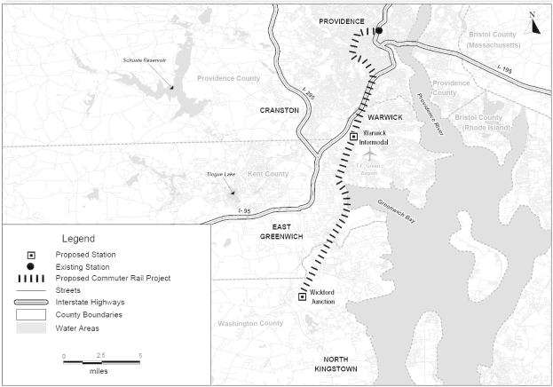 Schwarz-weiß-Karte einer Stadt mit einem Fluss, Straßen und Autobahnen, betitelt "Vorgeschlagenes Pendlerbahnprojekt" auf der linken Seite.